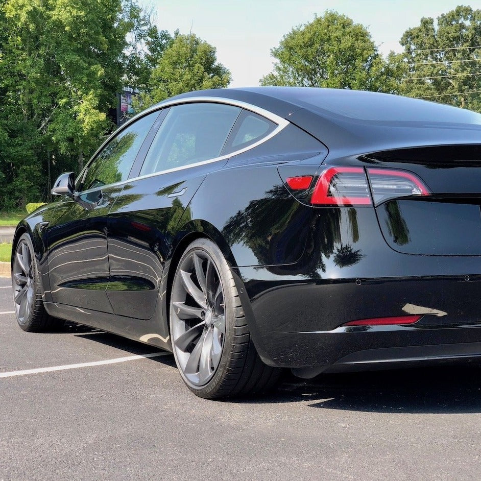 Tesla model 3 staggered wheels top